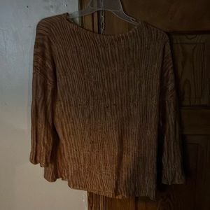 I’m selling a colorful knitted sweater for women